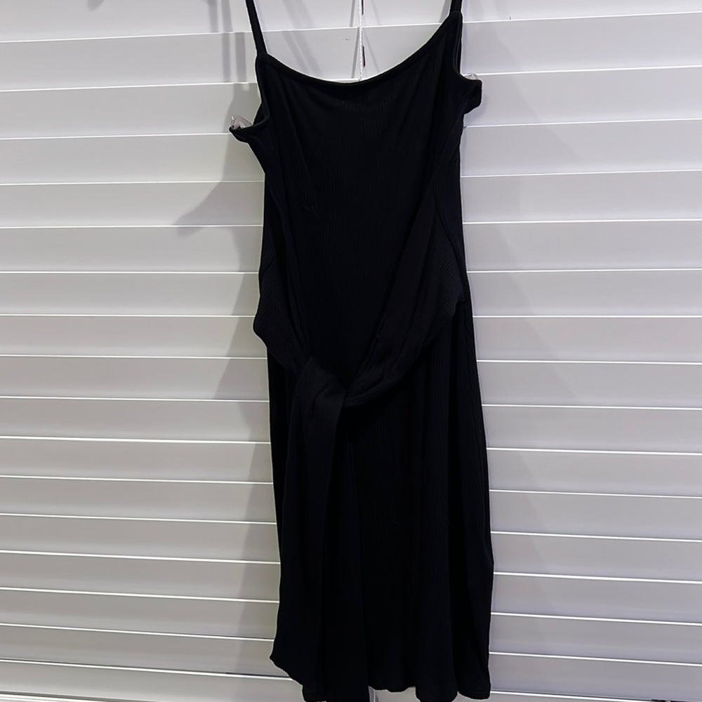 Black dress with tie in front. Worn a few times.